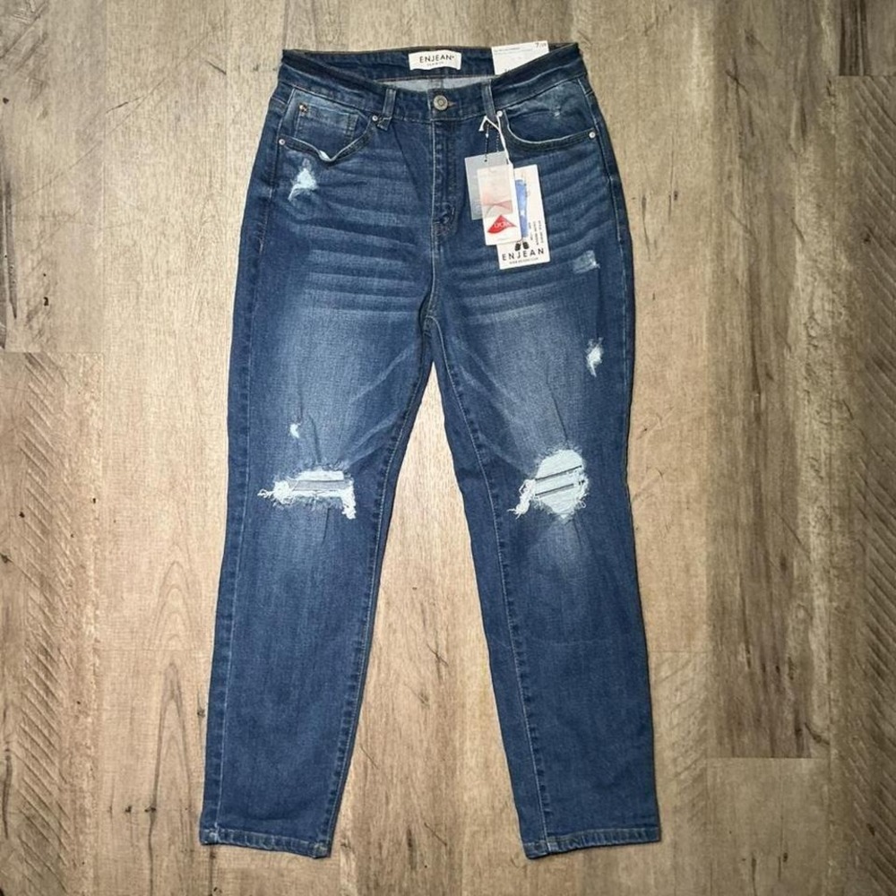 Enjean blue high-waisted straight leg jeans with distressed details. Size: 28"